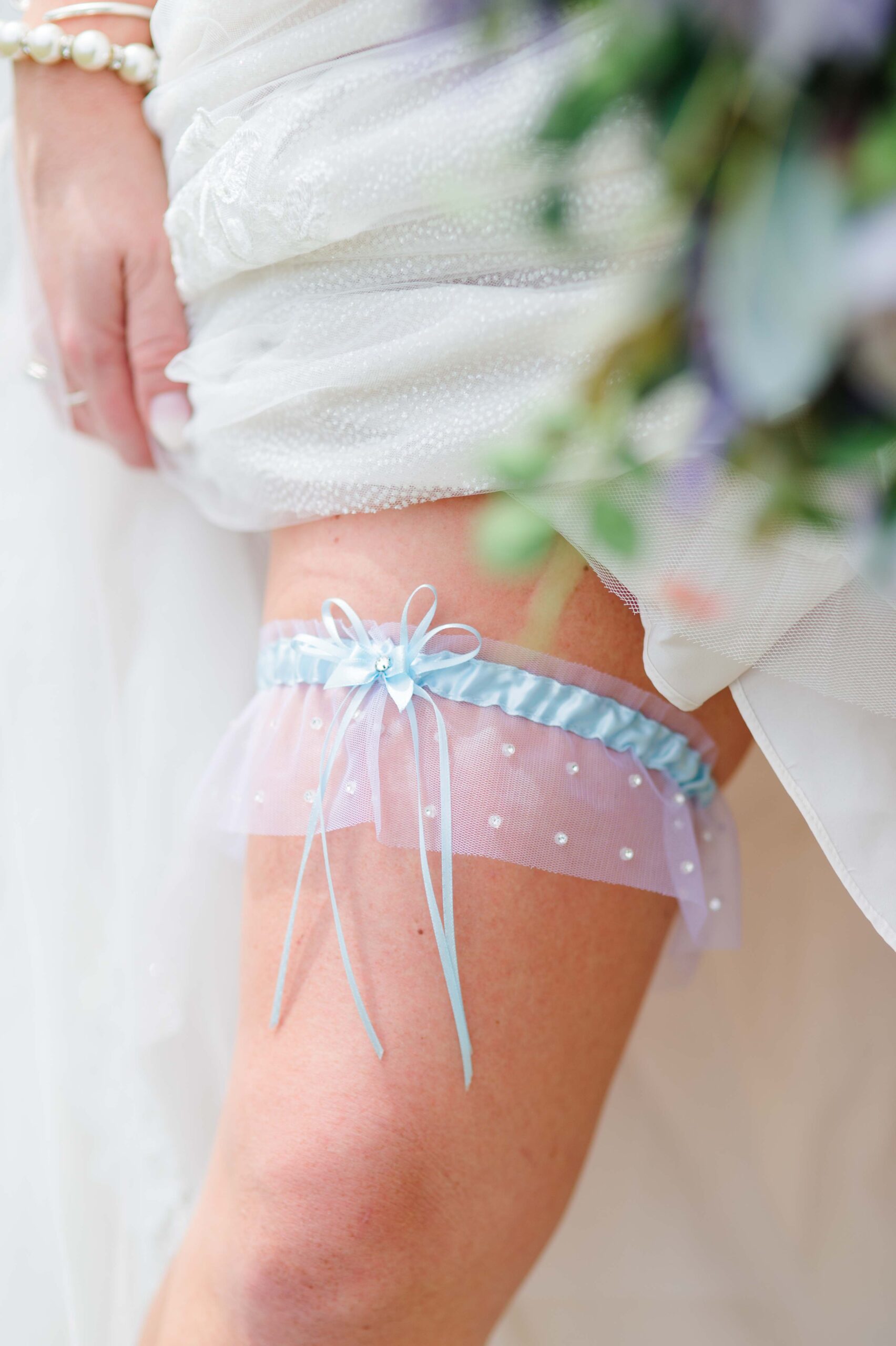 blue Bridal Garter on a bride